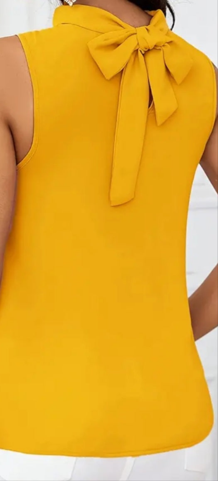 Golden yellow front ruffle back neck tie blouse